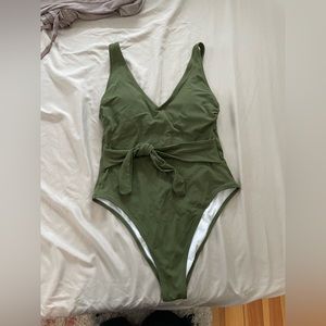 Green one piece bathing suit.  M